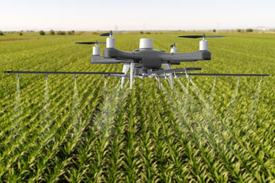 © Getty Images/iStockphoto Drone spraying a field